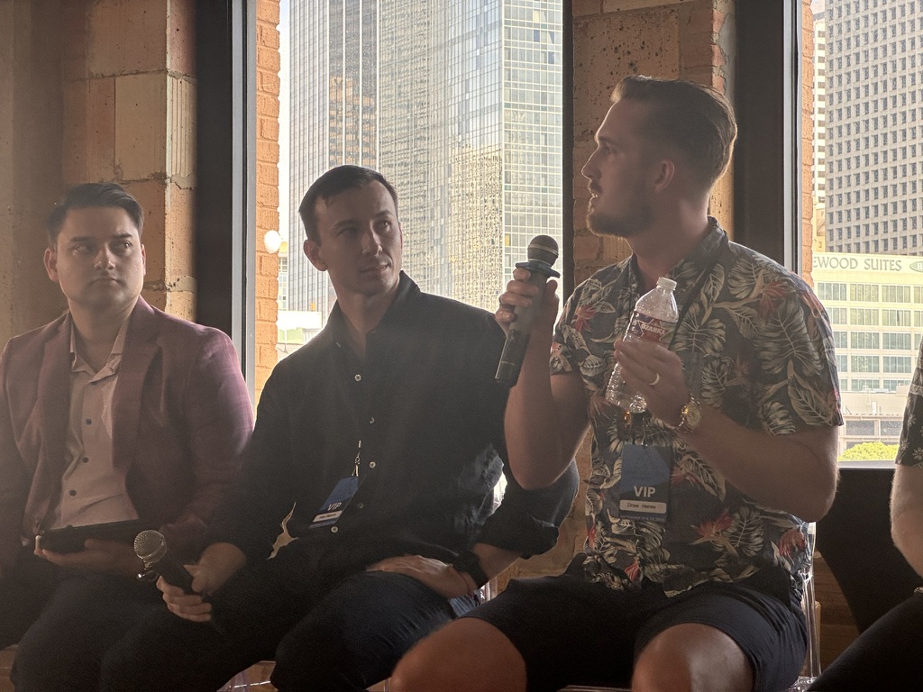Drew Haney speaking on a panel at the Land Scaling Summit